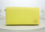 Skórzany portfel damski limonkowy, powystawowy